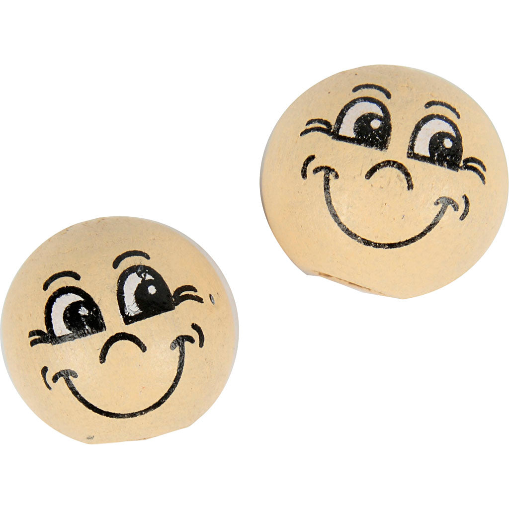 Houten ballen met gezichten